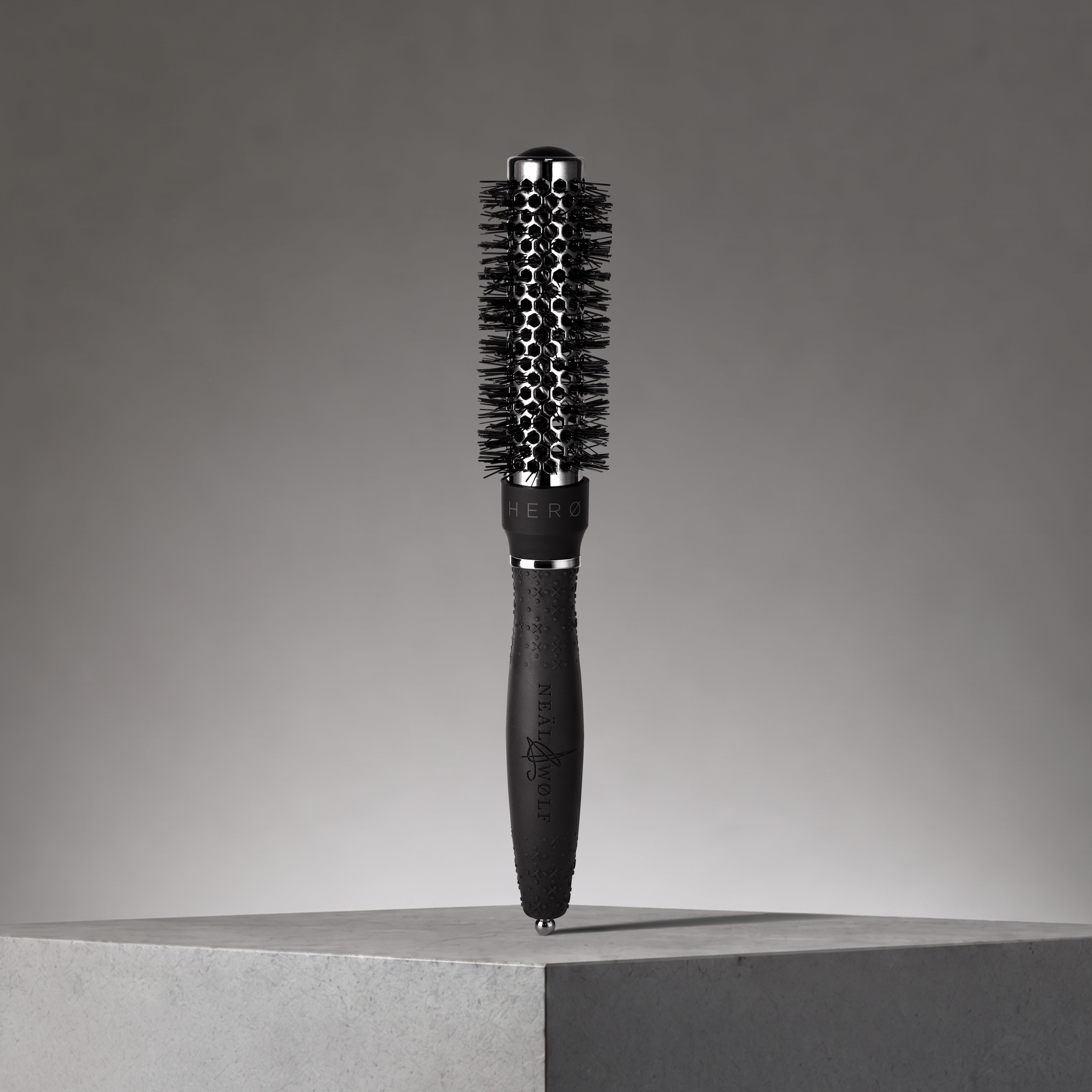Image of Neal & Wolf HERØ Round Ceramic Hair Brush 25mm with promo background