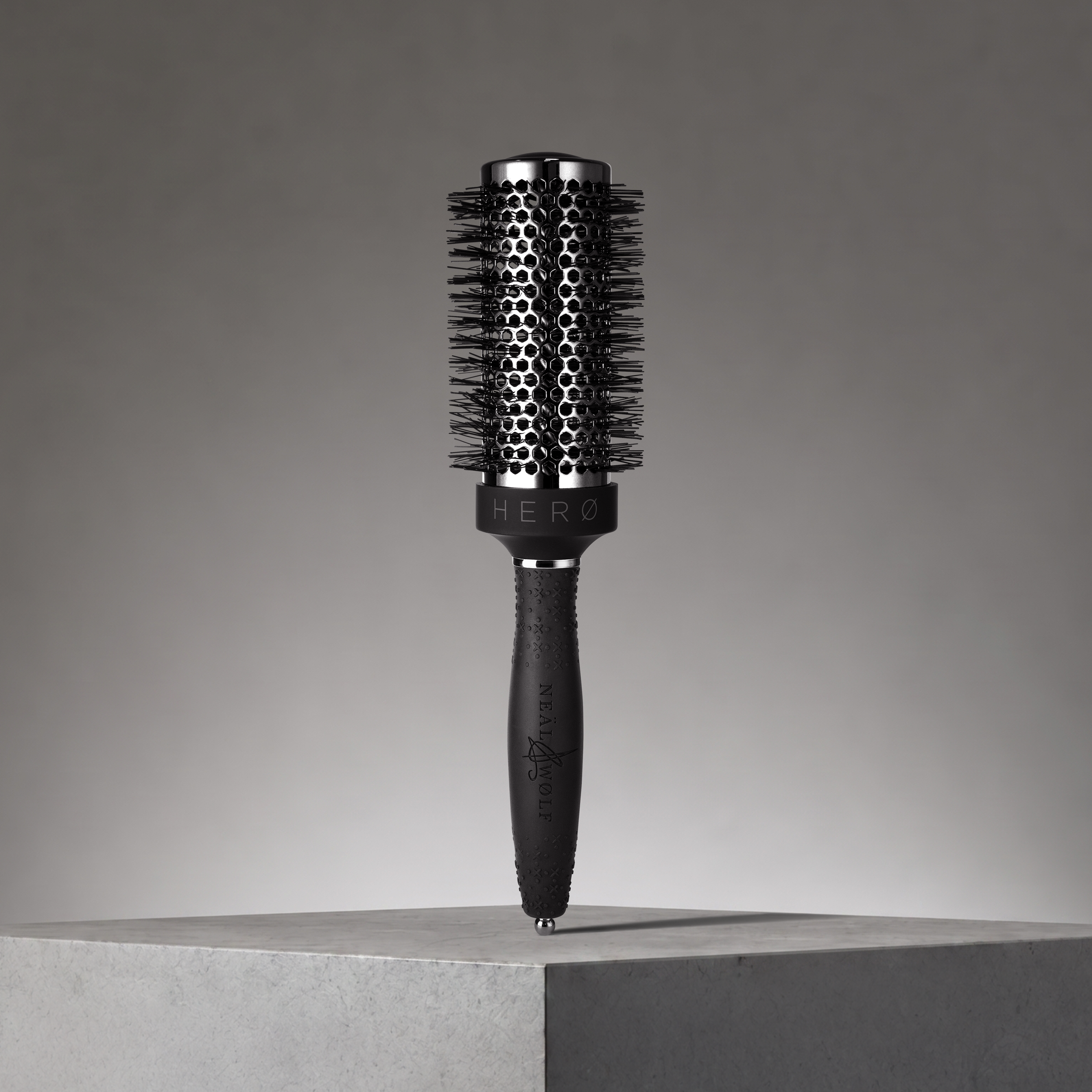Image of Neal & Wolf HERØ Round Ceramic Hair Brush 44mm with promo background